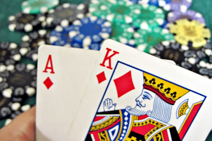 Ace and king of diamonds over casino chips