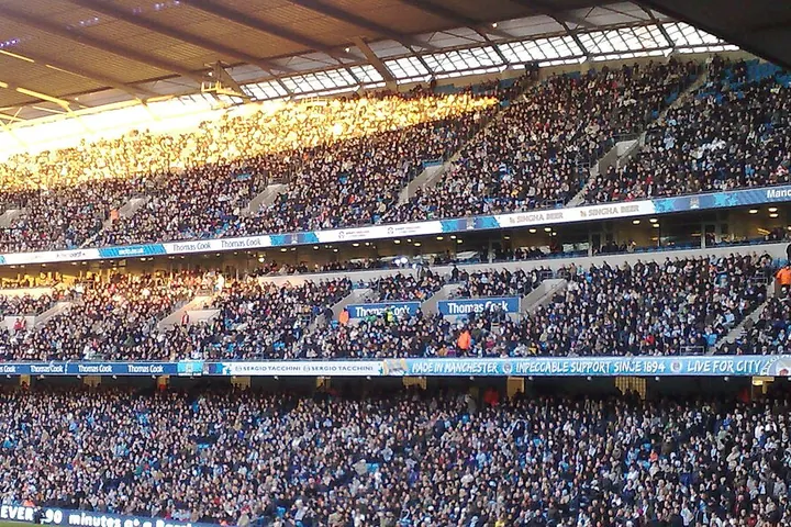 Football crowd in the stands of a stadium