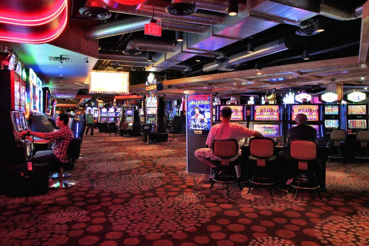 Rows of slot machines on a casino floor